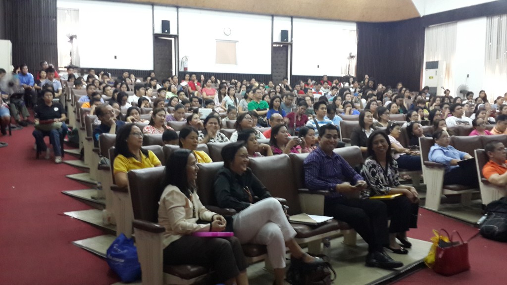 DELPS faculty members occupy the front row of the theatre