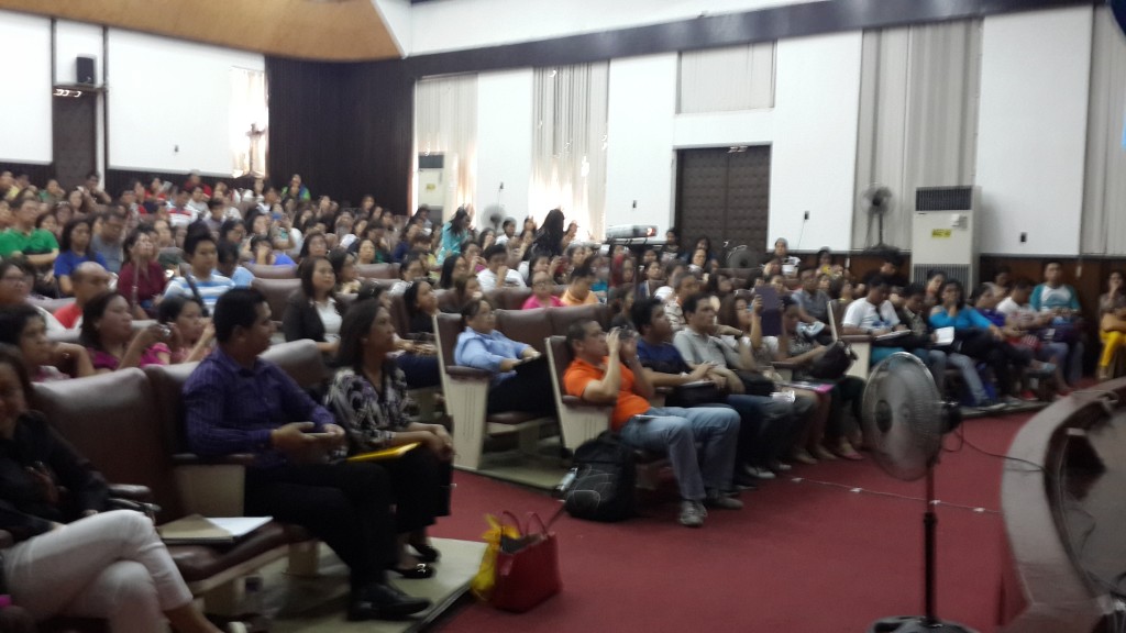 Lecture attendees fill the Benitez Theatre