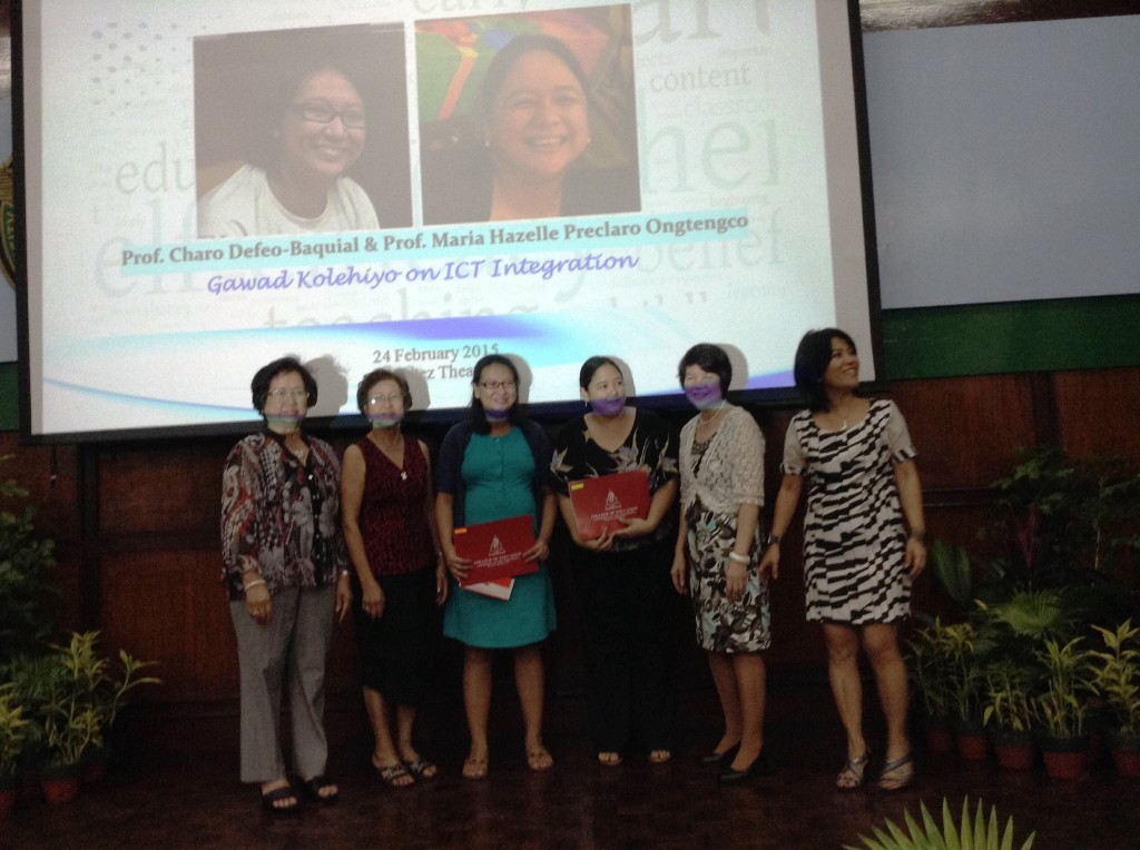 Prof. Defeo-Baquial and Prof. Ongtengco (center) receive their award for ICT INtegration