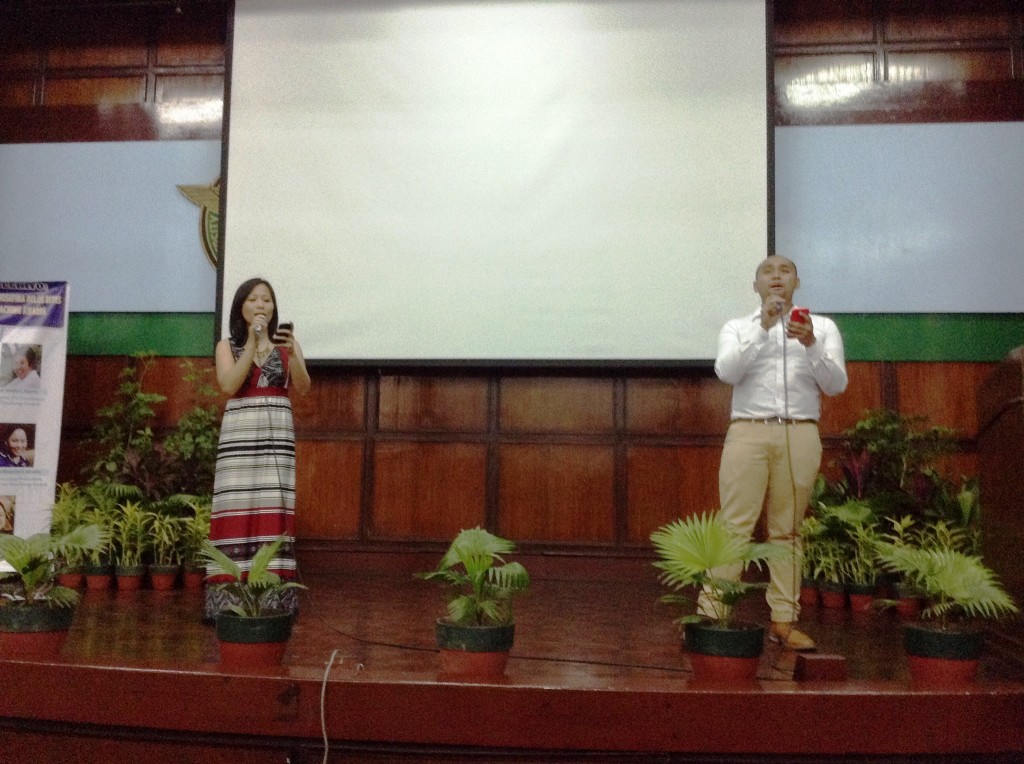 Teacher JM Dela Pena and Ms. Michelle Agas serenade the audience