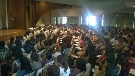 Symposium participants fill NISMED auditorium